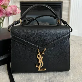 Saint Laurent CASSANDRA MINI TOP HANDLE BAG IN GRAIN DE POUDRE EMBOSSED LEATHER